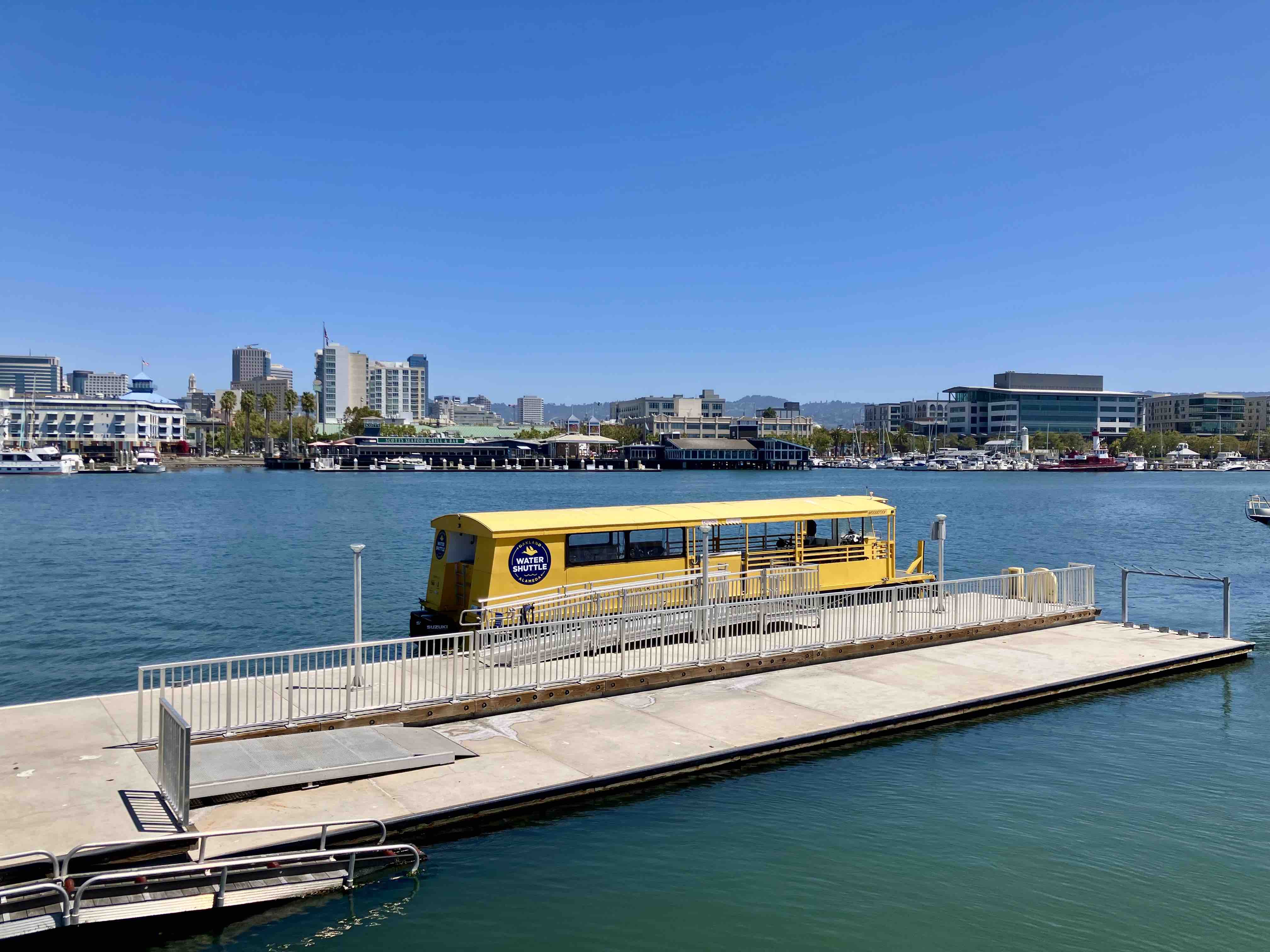 The Woodstock ferry on its second birthday, docked in Alameda, opposite Oakland Jack London Square